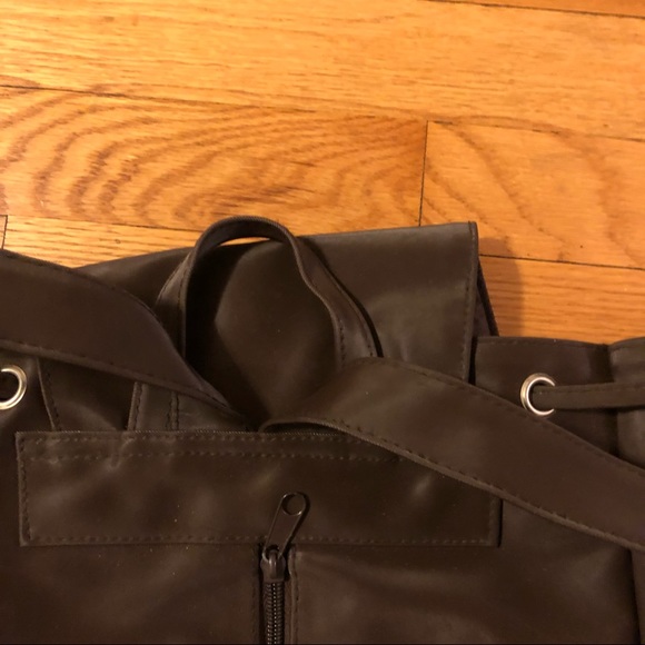 Kenneth Cole Reaction Weatherproof backpack with matching crossbody purse